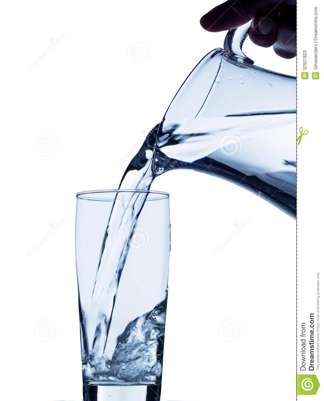 Pure Water Is Emptied Into A Glass Of Water From A Pitcher  Fresh