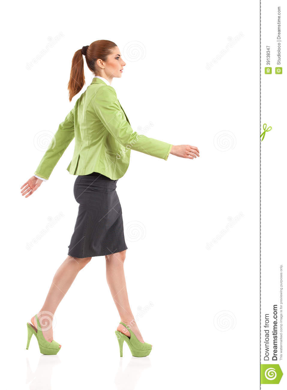 Walking Elegance Woman In Green Suit Mini Skirt And High Heels  Full    