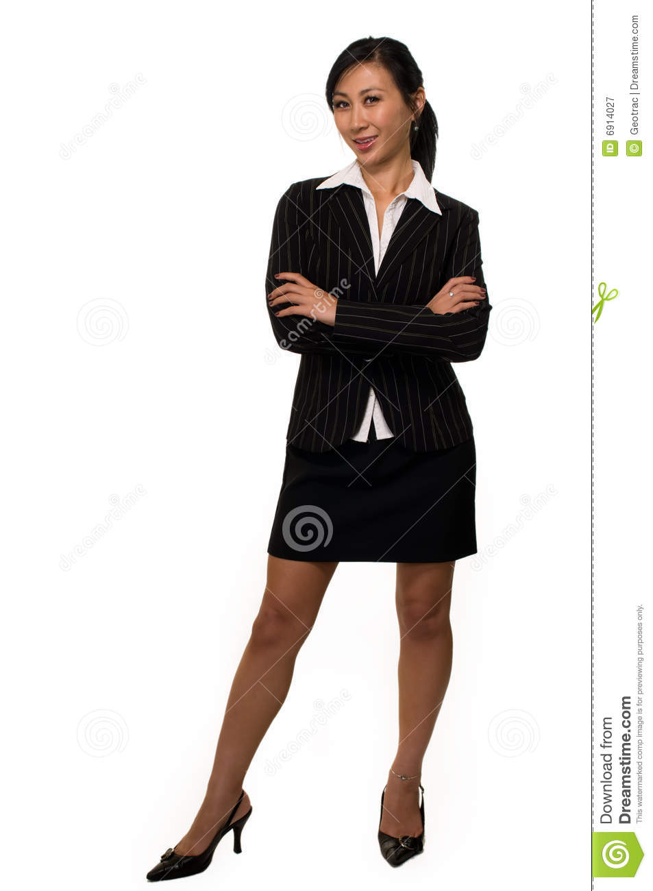 Woman Wearing Black Business Suit With Skirt Standing On White With