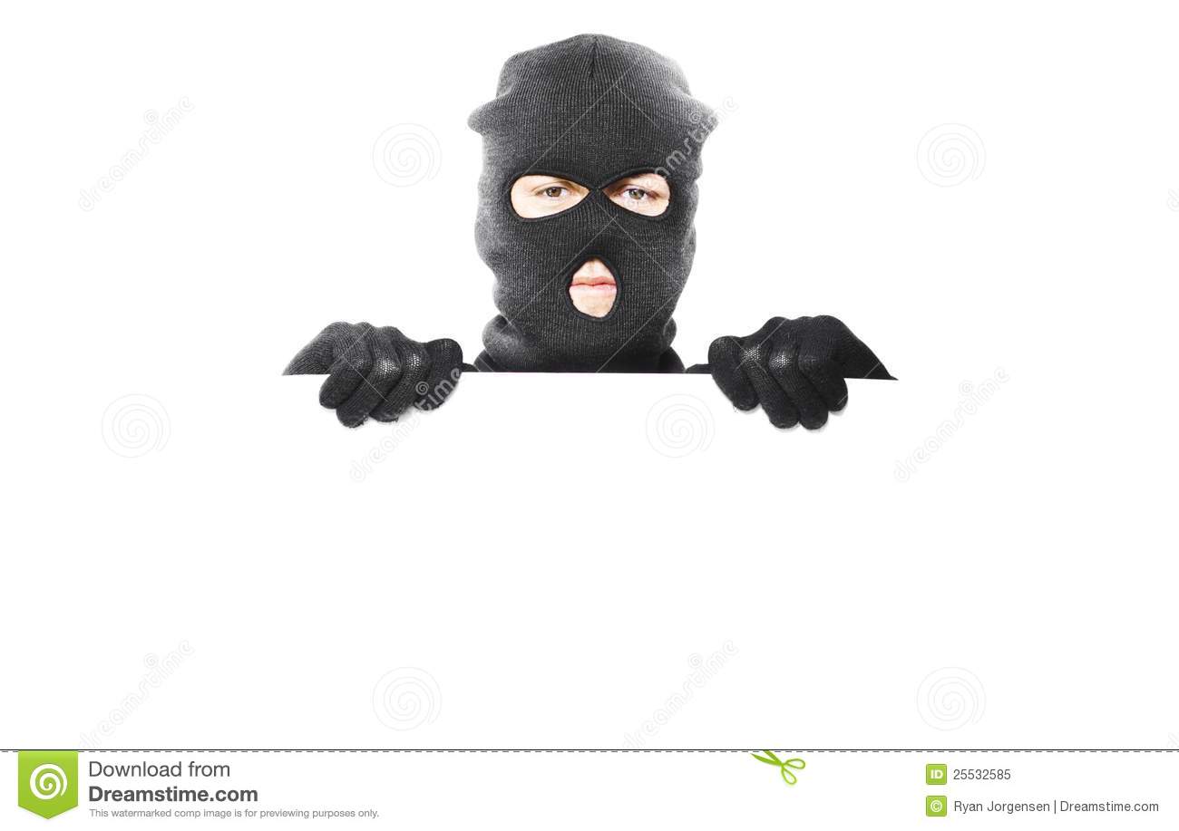 Royalty Free Stock Photo  Thief With Robbery Mask Holding Blank White