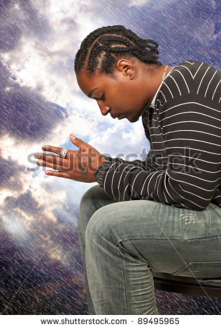Black African American Christian Man In Deep Prayer Stock Photo