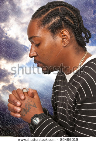Black African American Christian Man In Deep Prayer   Stock Photo