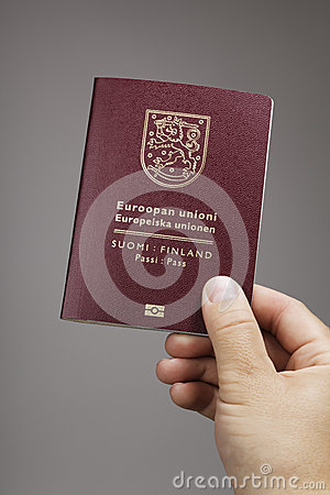 Man Holding A Finnish  Finland  Passport Ih His Hand  This Is The New