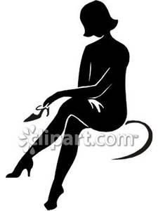 Silhouette Of A Sexy Woman Sitting Down   Royalty Free Clipart Picture