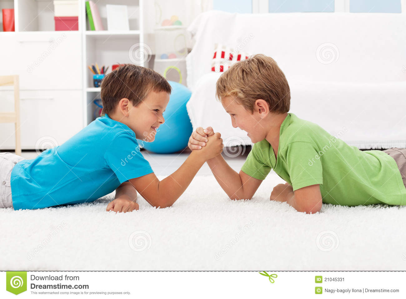 Boys Arm Wrestling In The Kids Room Stock Image   Image  21045331