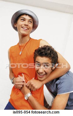 Stock Photo   Teenage Boys Wrestling  Fotosearch   Search Stock Images