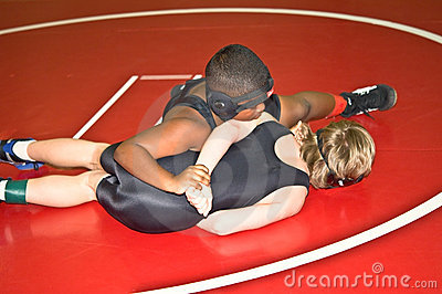 Two Young Competitors Wrestling During A Match In Gwinette County