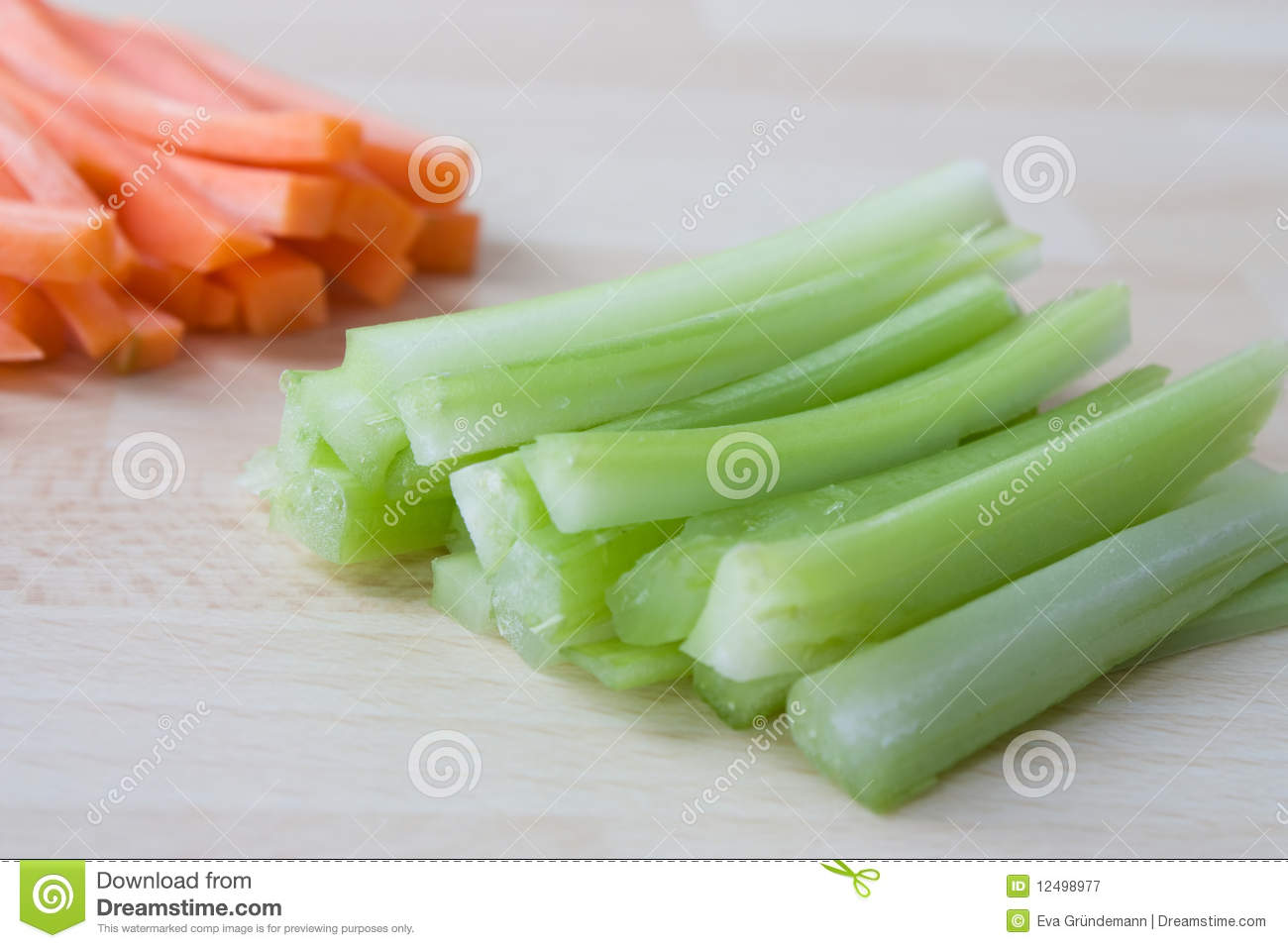 Selective Focus Image Of Sliced Celery With Carrots In The Background