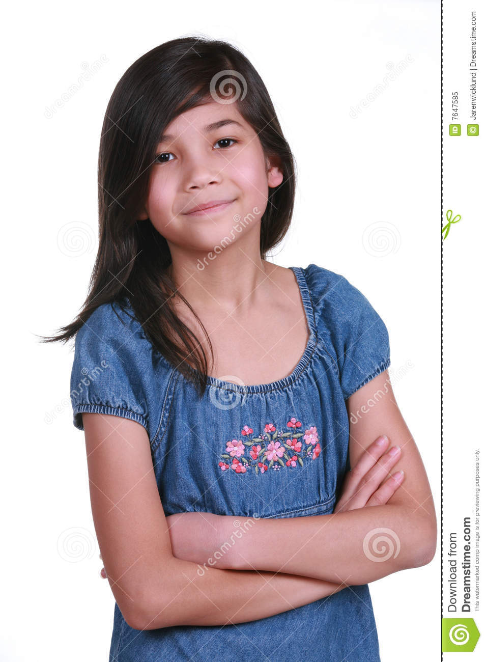 Confident Nine Year Old Girl Smiling With Arms Crossed  Part Asian    