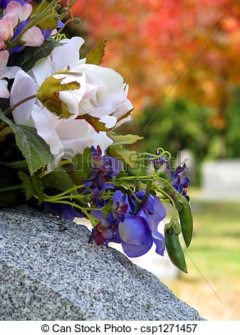 Picture Of Grave Flowers   Silk Flowers On A Cemetery Grave Headstone