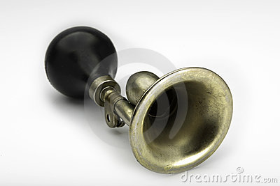 Brass Bicycle Horn With A Black Squeeze Bulb Isolated On A White