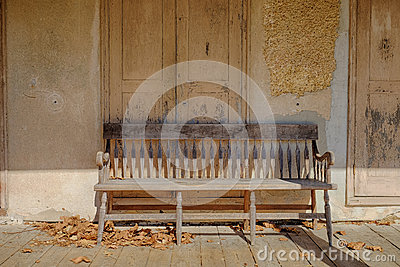 General Store Wall With A Old Weathered Wooden Bench On The Porch