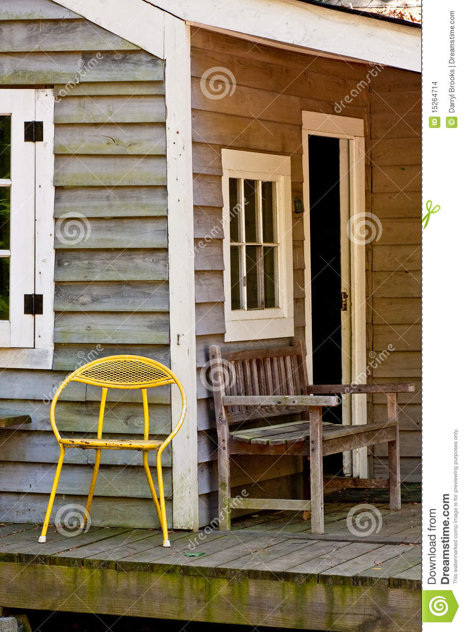 Metal Chair On An Old Bungalow Porch Stock Images   Image  15264714