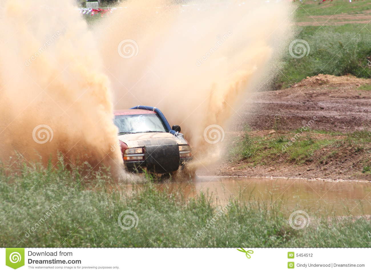 Four Wheel Drive Truck Raceing Through Mud
