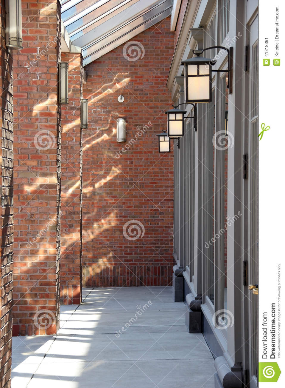 Outdoor Brick Patio With Lantern Lights And Light Reflection Stock