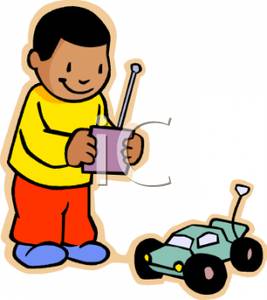 African American Boy Playing With A Remote Control Car   Royalty Free    