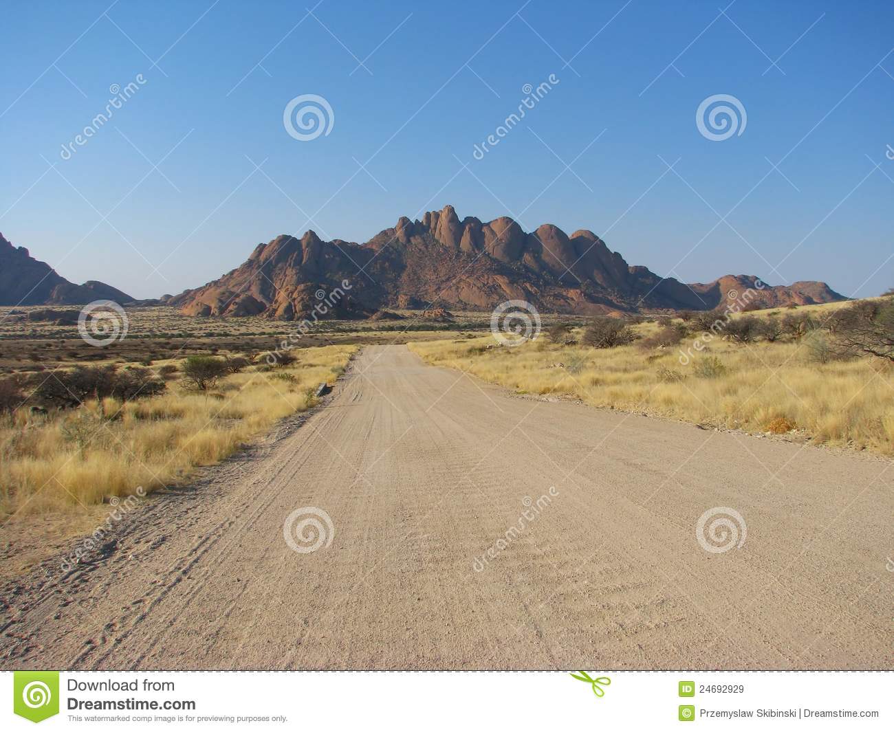 Namibian Gravel Road With Mountains In Background Royalty Free Stock