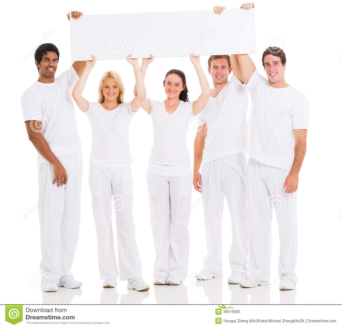Group Of Young People Holding A Blank White Board On White Background