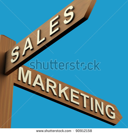 Sales Or Marketing Directions On A Wooden Signpost   Stock Photo