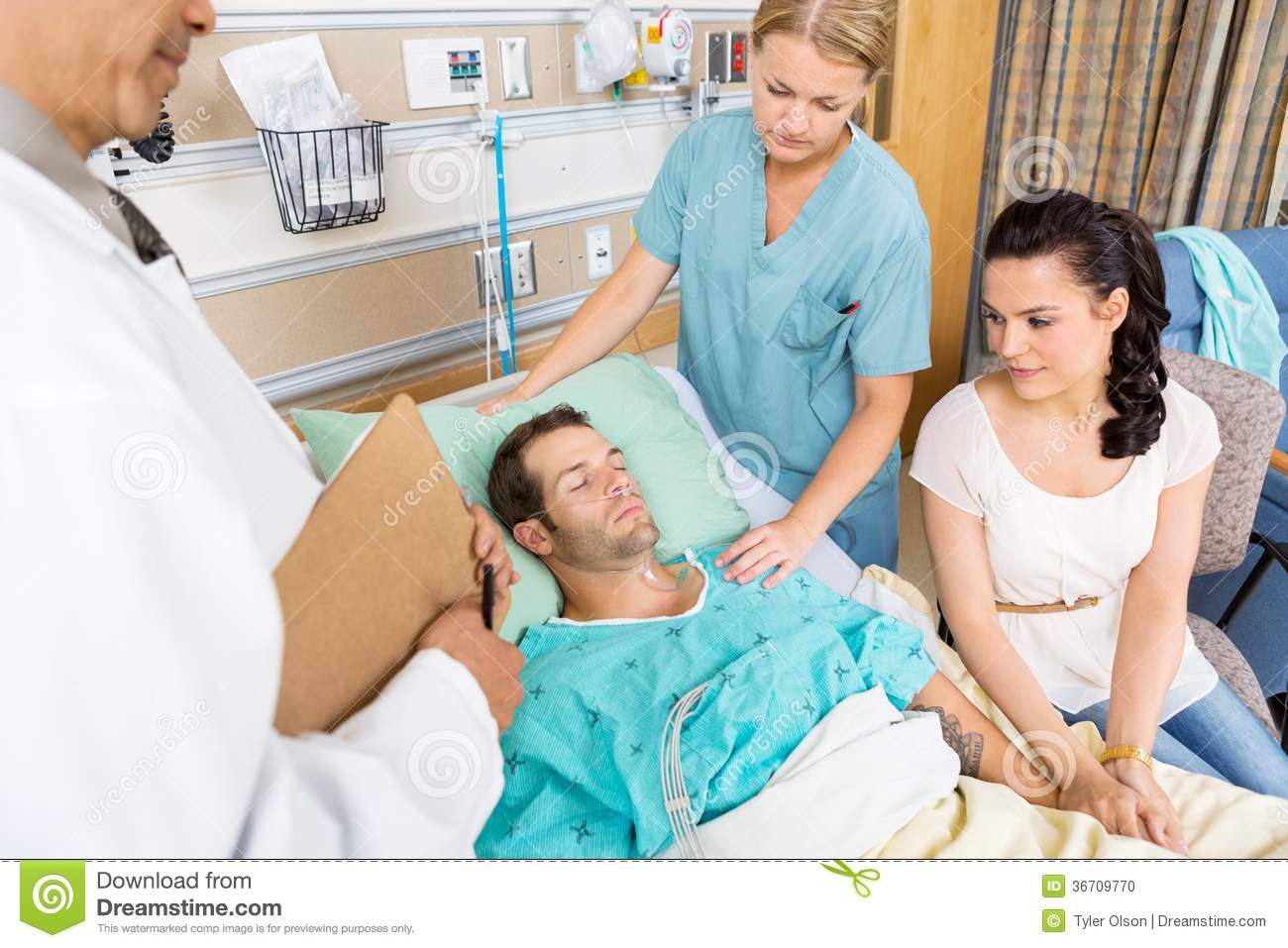 Loving Women Holding Patient S Hand While Doctor And Nurse Examining    