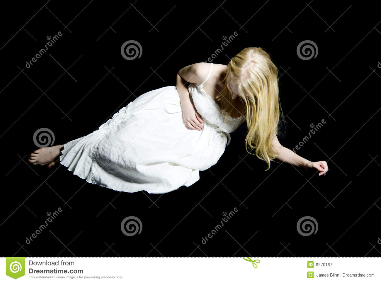 Girl Or Young Woman In Nightgown Clutching Her Abdomen In Pain 