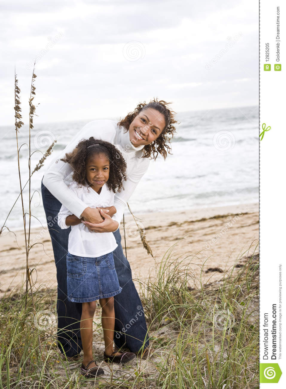 African American Mother And Daughter At Beach Royalty Free Stock Photo