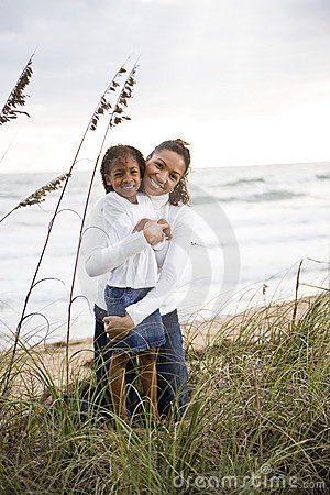 African American Mother And Daughter At Beach Stock Photo   Image