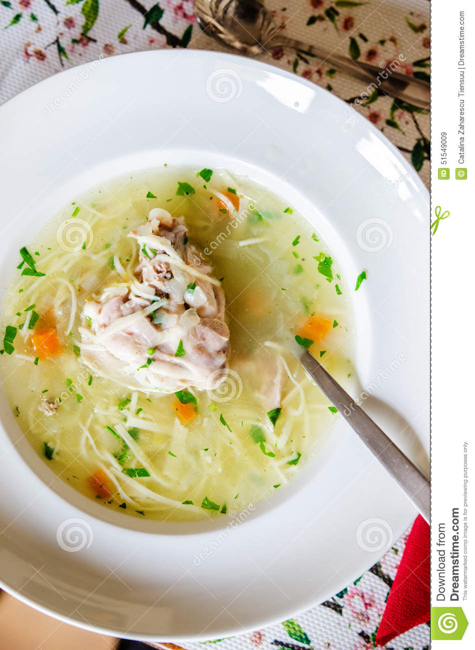 Hot Chicken Soup With Home Made Noodles And Parsley