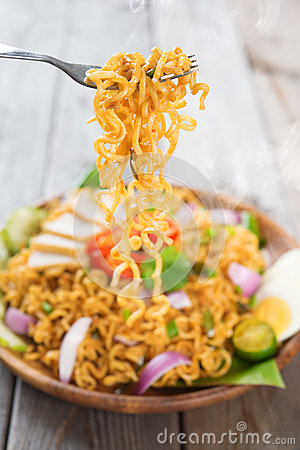 Spicy Fried Curry Instant Noodles Or Malaysian Style Maggi Goreng