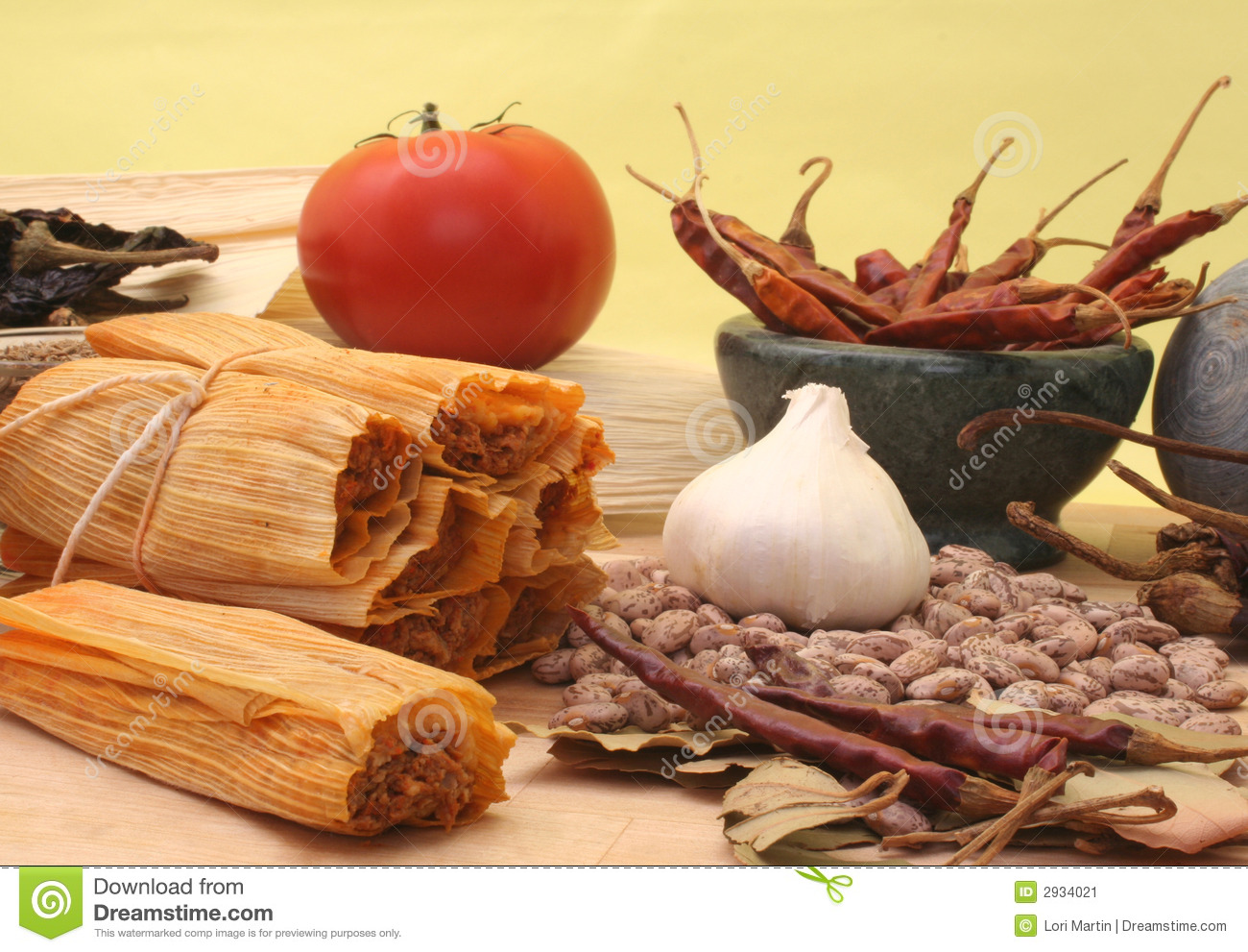 Tamales With Peppers And Beans On Yellow Background 