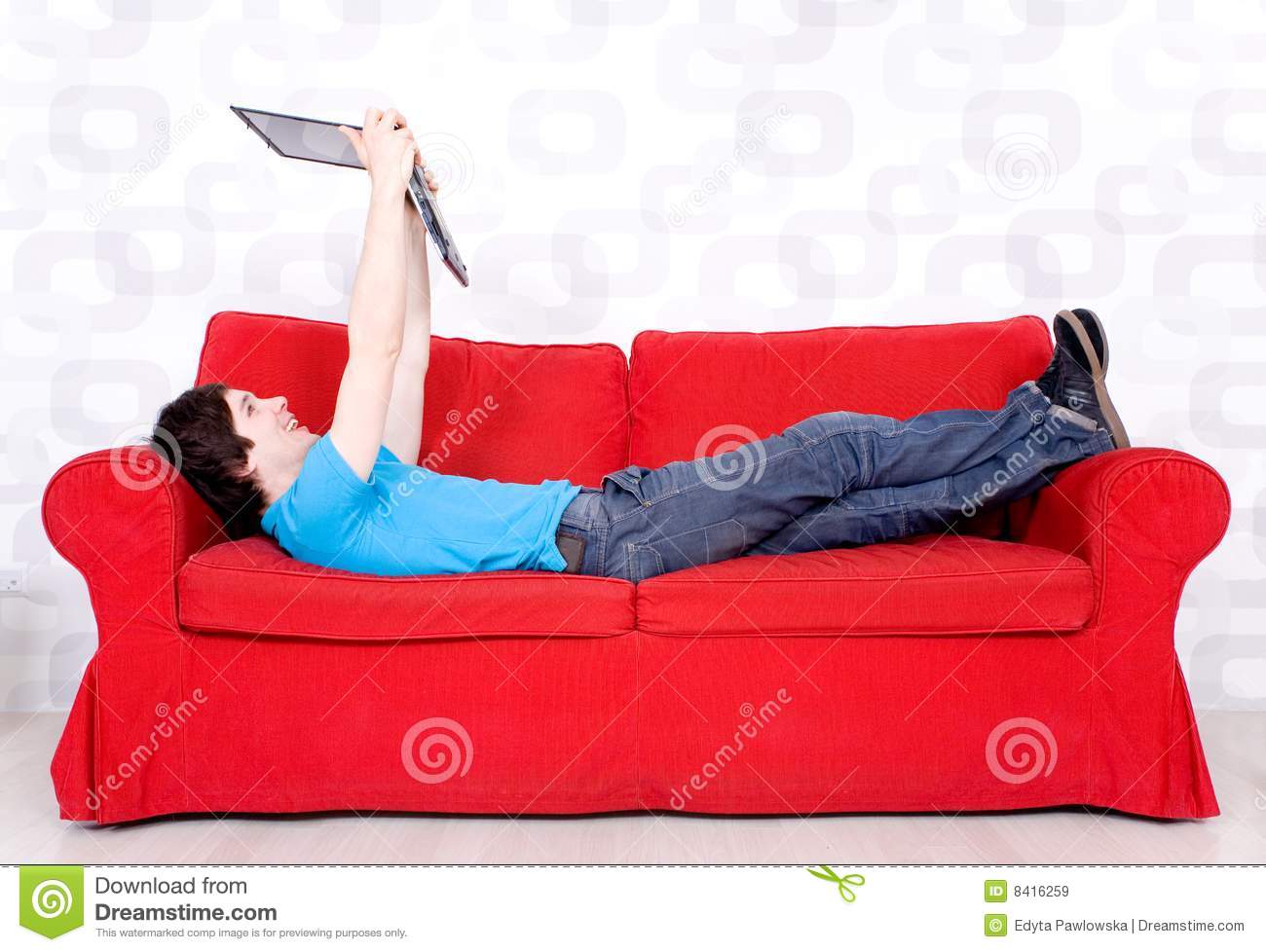 Man Lying On Couch With Laptop Royalty Free Stock Images   Image