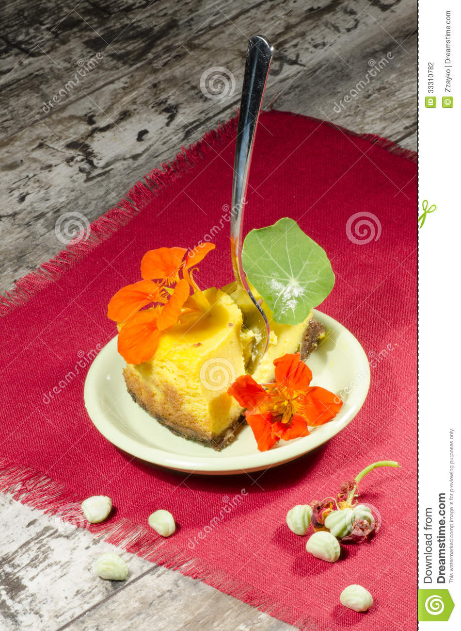 Pumpkin Cheesecake Decorated With Fresh Flowers  From The Series