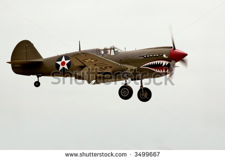 World War Two P 40 Airplane Landing At An Air Show    Stock Photo