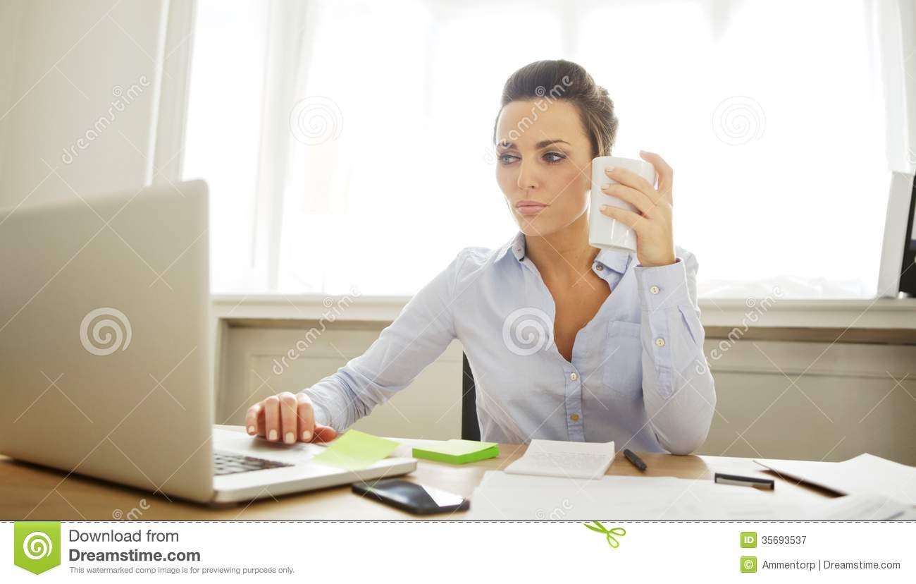 Beautiful Young Woman Working In Home Office Royalty Free Stock