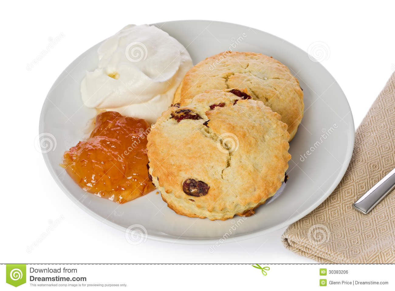 Two Homemade Cranberry Scones With Marmalade And Fresh Cream On A    