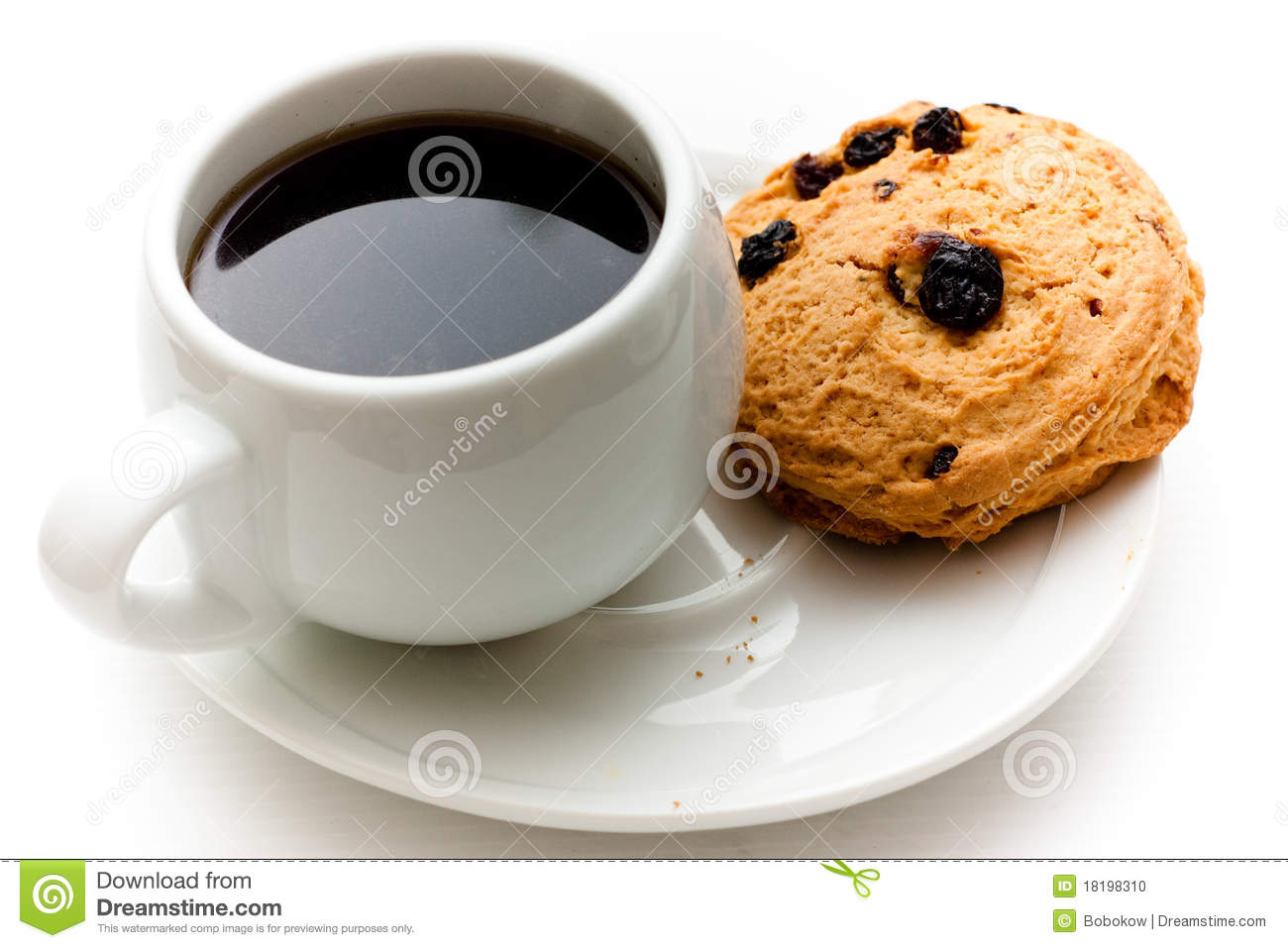 White Cup Filled With Black Coffee And Scones
