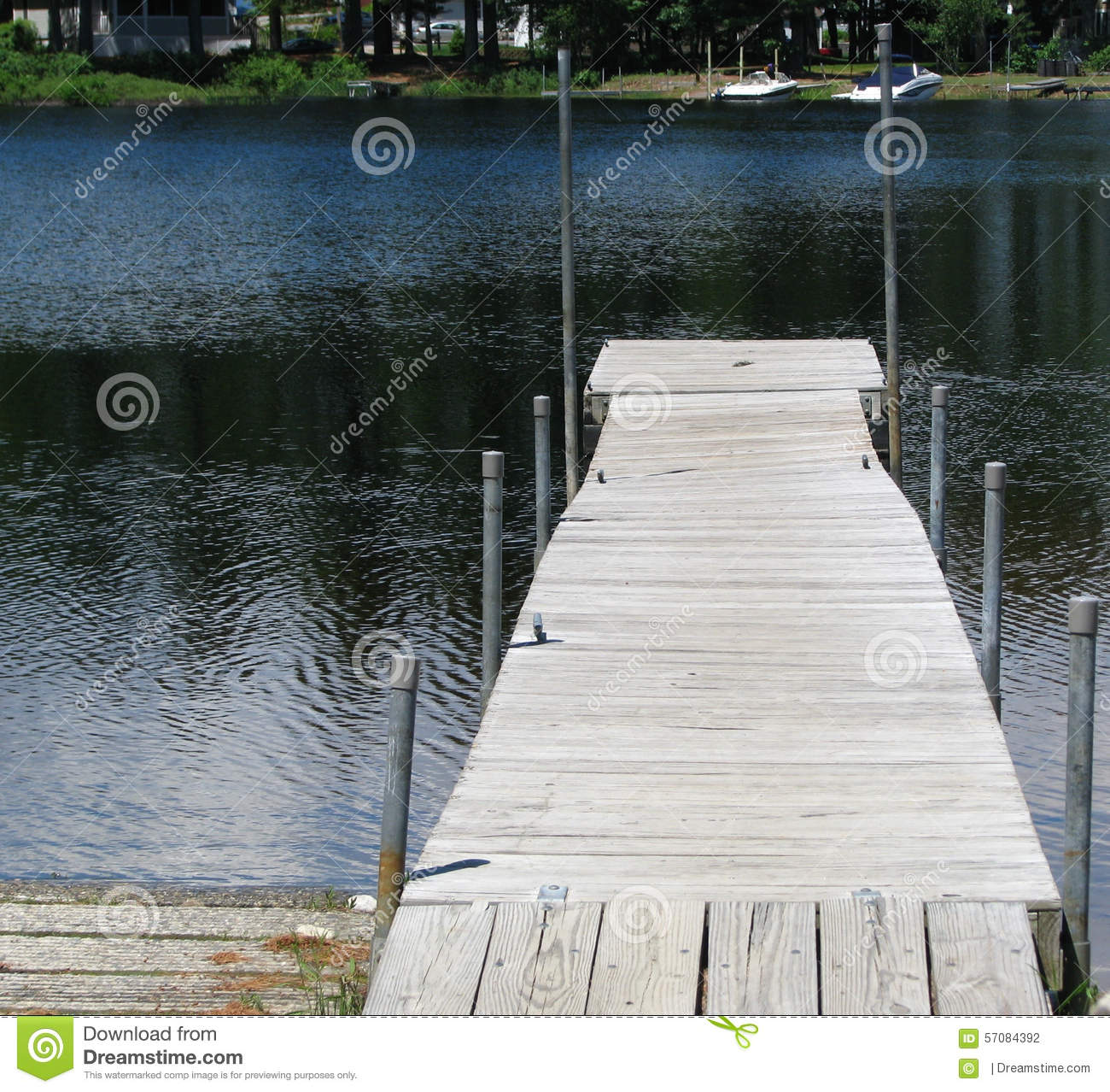 Wooden Dock Over Dark Blue Rippled Lake Water  Sebago Lake Sebago