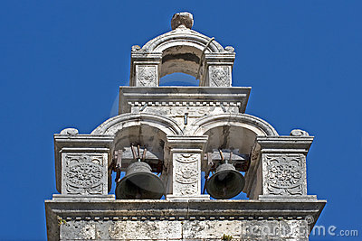 Church Bell Tower With Two Bells Ringing