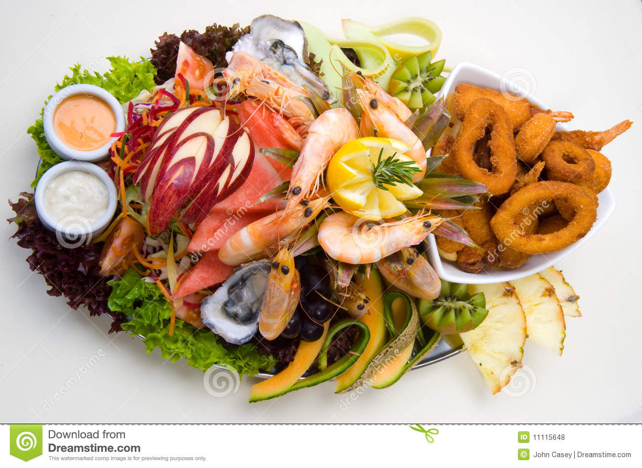 Seafood Platter Served Fresh And Deep Fried Surrounded With Salad And
