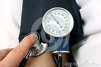 Nurse Measuring The Blood Pressure Stock Photo   Image  24834460