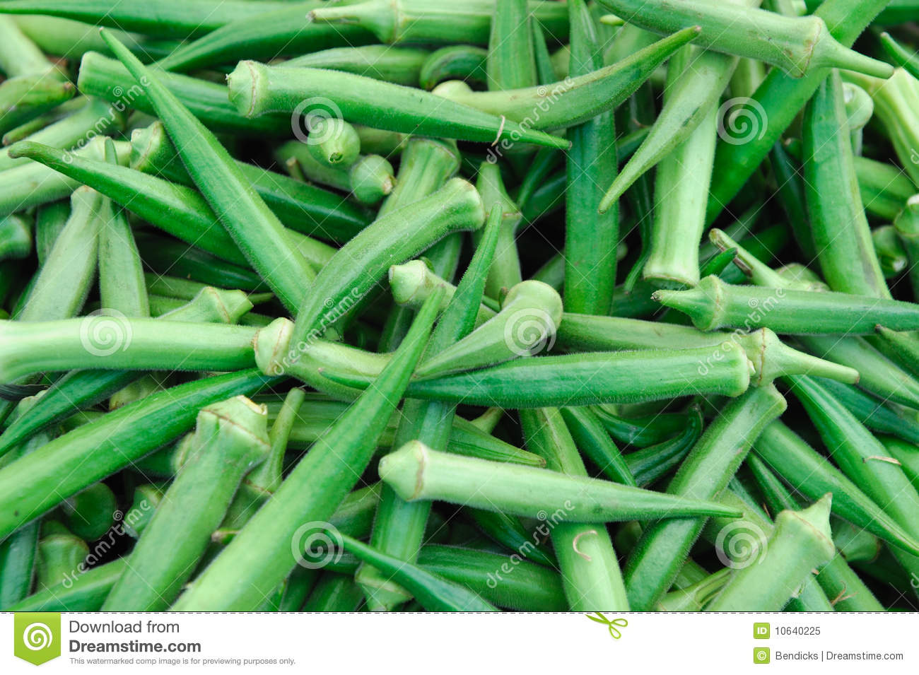 Large Pile Of Fresh Picked Green Okra Displayed At A Farmers Market 