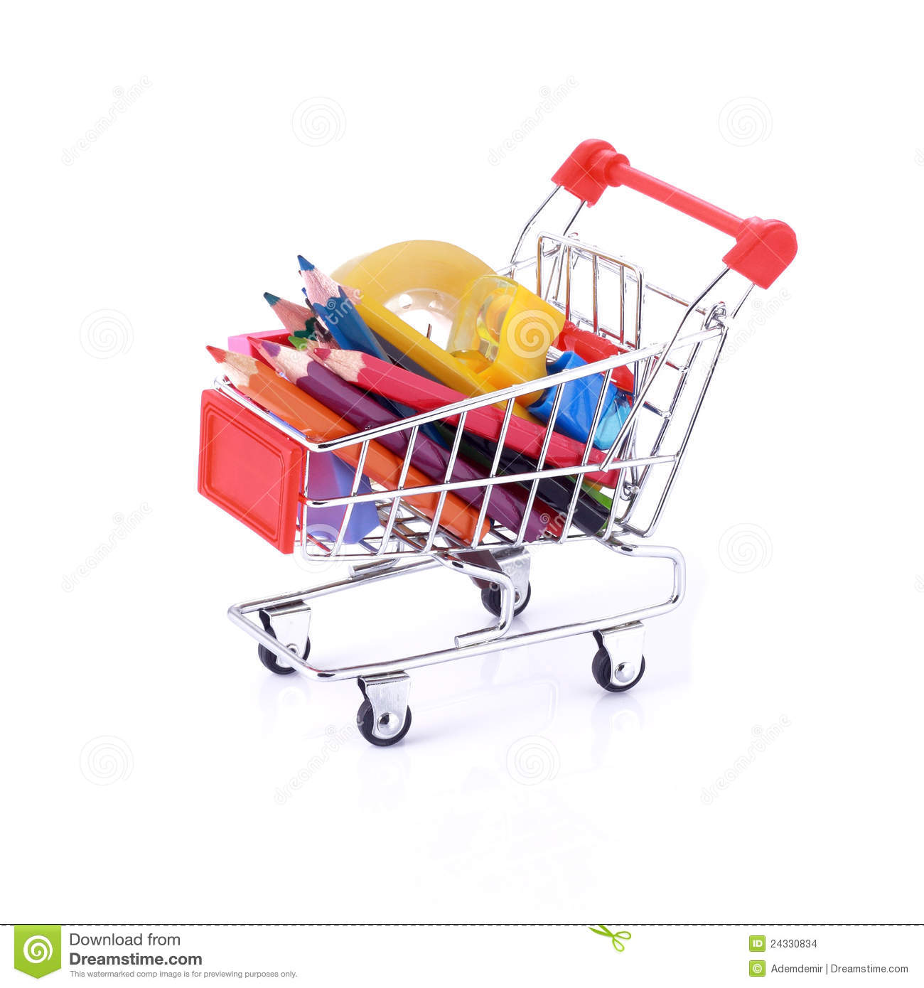Color Pencils And Some Stationery In Miniature Shopping Cart Isolated