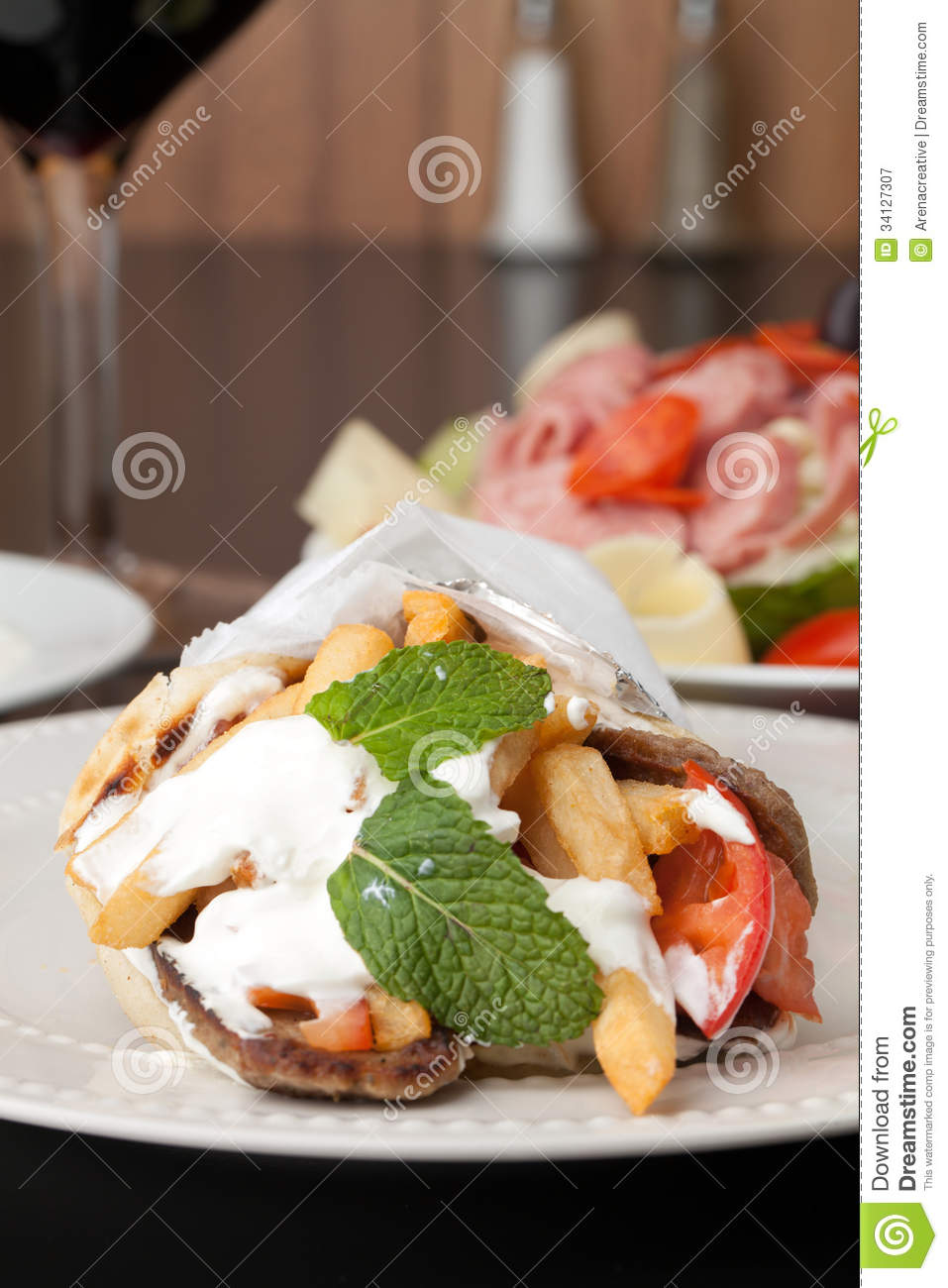 Traditional Gyro Sandwich With Meat Tzatziki Sauce Tomato Onions And