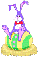 Easter Bunny On Egg Clip Art Gif