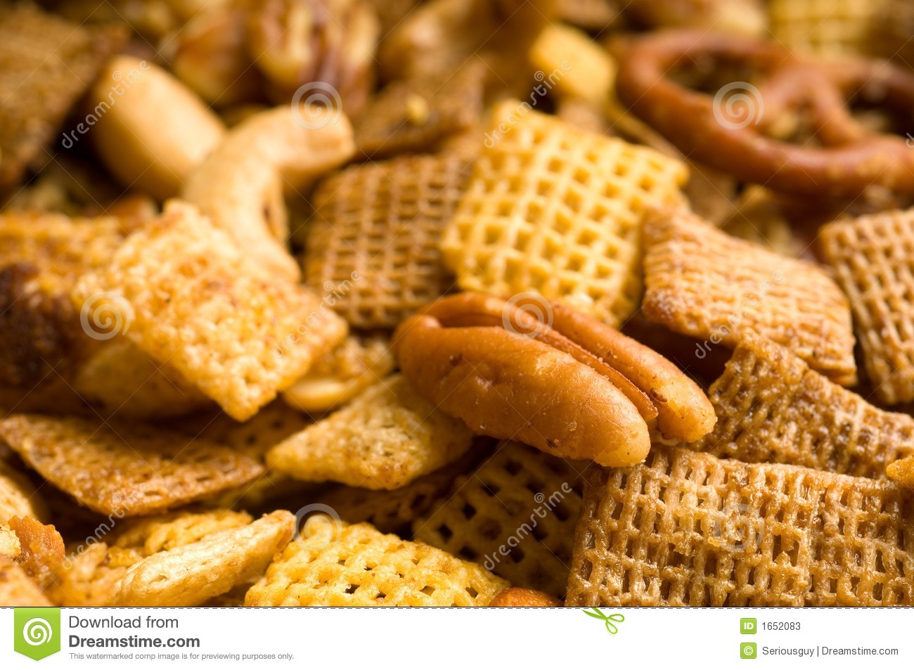 Up Of Cereal Pretzel And Nut Snack Mix Background With Limited Dof