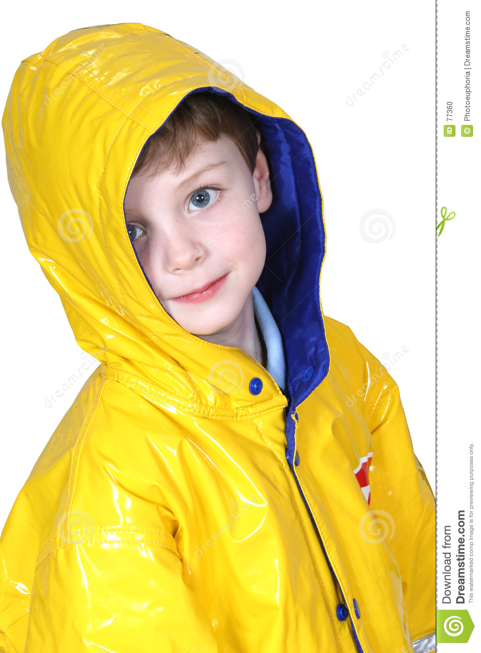 Four Year Old Boy With Big Blue Eyes In A Yellow Rain Coat Against A