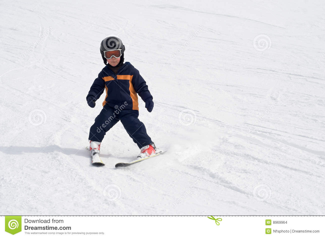 Four Year Old Child Learning To Ski Alone On The Snow Using Wedge To
