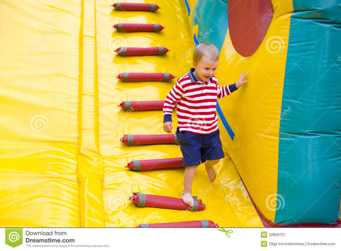 Royalty Free Stock Photography  Four Year Old Kid Playing On A