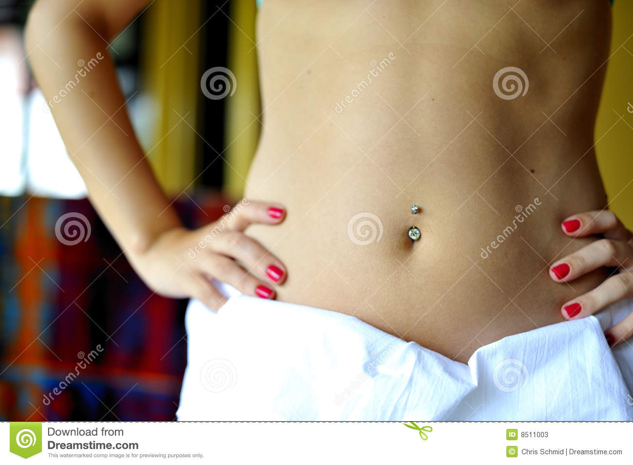 Woman Showing Her Tummy With Red Nailes