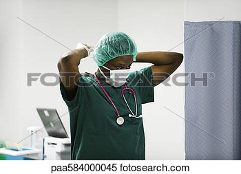 Stock Image Of Nurse Putting On Surgical Mask Paa584000045   Search